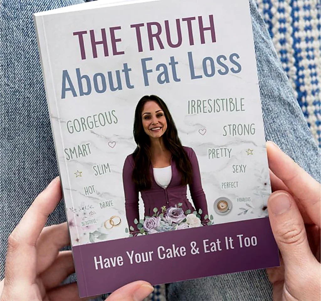 FitSpresso bonus guide “The Truth About Fat Loss” shown in hands for informational review page.